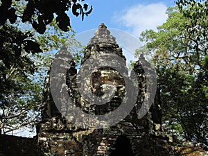 Relief carvings on stone walls of ancient sacred temple in the city of Ankgor Wat