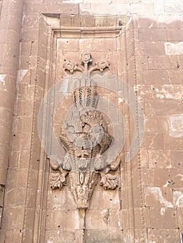 relief craftsmanship design on the centuries-old palace wall photo