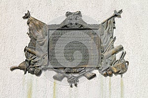 Relief on a decorative wall - a memorial plate