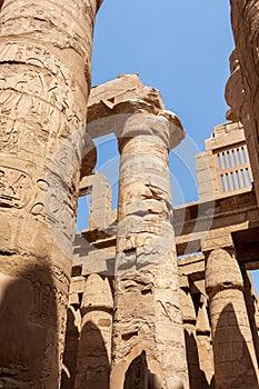 Relief details and Egyptian hieroglyphs at Karnak temple complex in Egypt