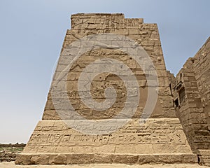 Relief left upper facade of the Migdol Gate entrance to the Mortuary Temple of Ramesses III in Medina Habu.