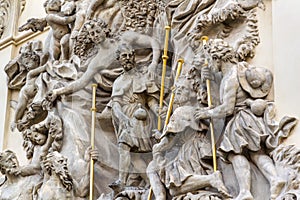 Relief sculpture on facade of the Church of Saint James The Greater with Minorite monastery in Old Town of Prague, Czech Republic