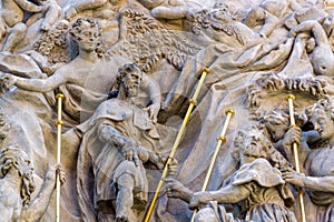 Relief sculpture on facade of the Church of Saint James The Greater with Minorite monastery in Old Town of Prague, Czech Republic