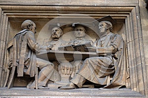 Relief sculpture on the University of Oxfords Examination Schools Building. Oxford