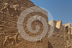 Reliefs at walls in the ancient city of Babylon, Iraq photo