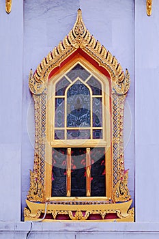 religion art of Thai Buddhist temple windows