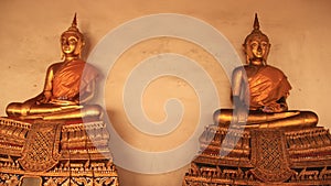 Religion. Golden Buddhas Image With Mortar Walls photo