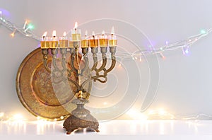 Religion image of jewish holiday Hanukkah background with menorah (traditional candelabra)