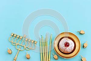 Religion image of jewish holiday Hanukkah background with menorah (traditional candelabra). Top view