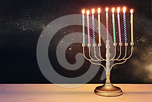 Religion image of jewish holiday Hanukkah background with menorah & x28;traditional candelabra& x29; and candles