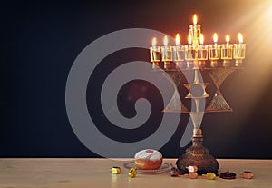 Religion image of jewish holiday Hanukkah background with menorah & x28;traditional candelabra& x29; and candles