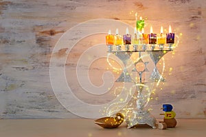 Religion image of jewish holiday Hanukkah background with menorah & x28;traditional candelabra& x29; and candles