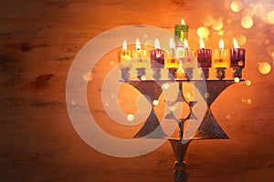 Religion image of jewish holiday Hanukkah background with menorah & x28;traditional candelabra& x29; and candles