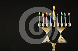 Religion image of jewish holiday Hanukkah background with menorah & x28;traditional candelabra& x29; and candles