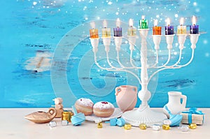 religion image of jewish holiday Hanukkah with white menorah & x28;traditional candelabra& x29;