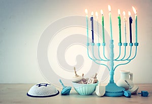 religion image of jewish holiday Hanukkah with white menorah & x28;traditional candelabra& x29;