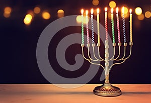 religion image of jewish holiday Hanukkah with white menorah & x28;traditional candelabra& x29;