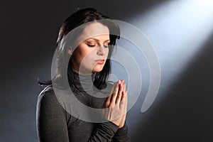 Religion moment eyes closed young woman in prayer