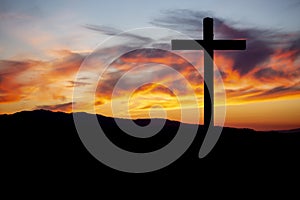 Religion theme, catholic cross and sunset