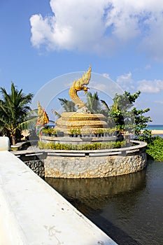 The religious art of Naga statue on the beach