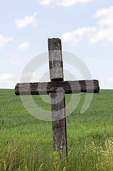 religious catholic cross made of wood in nature