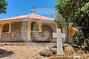 Religious christian cross behind monastery on Lake Tana, Ethiopia Africa photo
