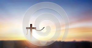 religious concept, Cross of jesus christ break barrier wire on calvary sunday background