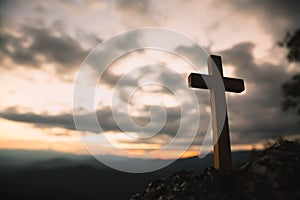 Religious concepts. Christian wooden cross on a background with dramatic lighting,  Jesus Christ cross, Easter, resurrection