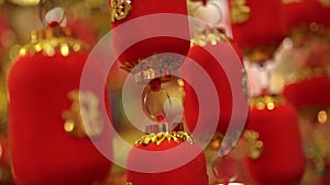 Religious decorations of red colour with golden symbols