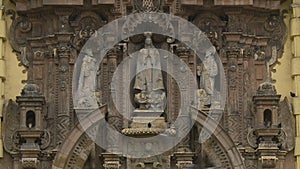 Religious Effigy Carvings on Building