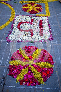 Religious festival of the corpus domini with infiorata artistic drawings with flowers
