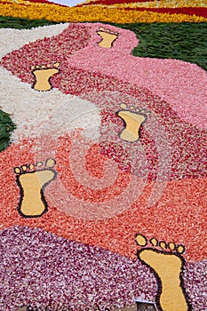 Religious festival of the corpus domini with infiorata artistic drawings with flowers