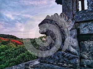 Religious figure of a mythical creature at Uluwatu temple on Bali island in Indonesia