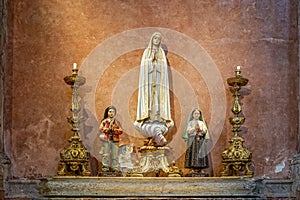 religious figures of saints of the catholic church, our lady of FÃ¡tima, santo Francisco Marto, santa Jacinta Marto