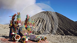 Religious flowers for sale at smoking active volcano Batok in Indonesia