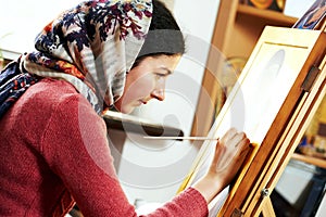 Religious icon painter woman