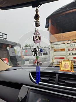 Religious idol stuff for car hanging