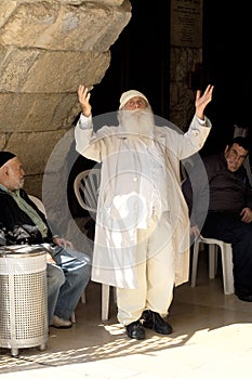 A religious prays at the Wailing Wall