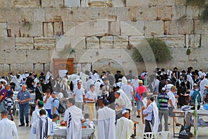 Religious Jews in white prayer shawls
