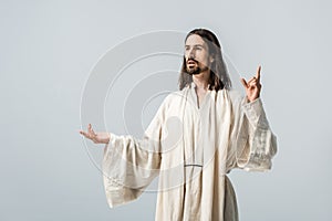 Religious man gesturing isolated on grey