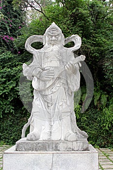 Religious marble statue with a guitar, Zhaoqing, China