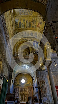 Religious mosaic painting on the dome of St. Marco Church intern