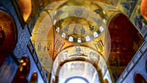 Religious mosaic painting on the dome of St. Marco Church intern