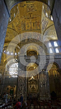 Religious mosaic painting on the dome of St. Marco Church intern