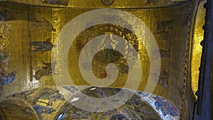 Religious mosaic painting on the dome of St. Marco Church intern