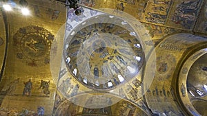 Religious mosaic painting on the dome of St. Marco Church intern