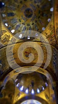 Religious mosaic painting on the dome of St. Marco Church intern