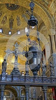 Religious mosaic painting on the dome of St. Marco Church intern