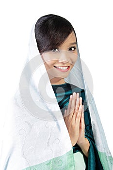 Religious muslim girl smiling, isolated on white