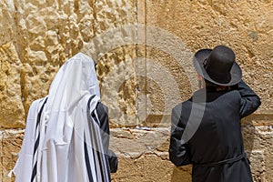 The religious orthodox Jews pray at the western wall. Jerusalem, Israel.